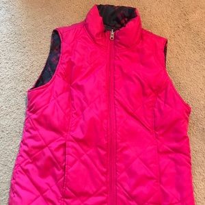Size medium reversible vest.